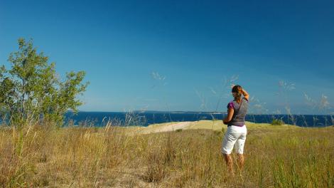 Woman taking in the view at Sleeping Bear Point