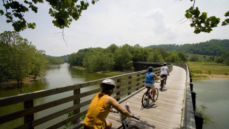 Biking a boardwalk over water on the Virginia Creeper Trail