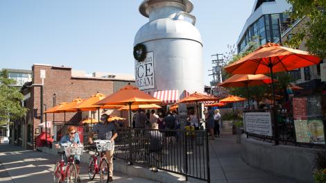 Biking by Little Man Ice Cream in the Highland neighborhood
