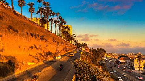 Driving the Pacific Coast Highway at sunset in Santa Monica, California