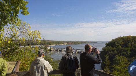 Visitors enjoy the scenic overlook while hiking in Heritage Corridor