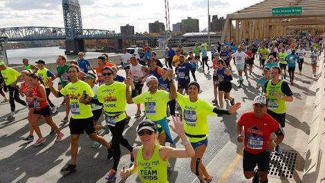 Crossing the Harlem River on the Willis Avenue Bridge during the New York Marathon Crossing the Harlem River on the Willis Avenue Bridge during the New York Marathon