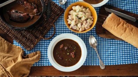 Serving of savory seafood gumbo, the star of the meal Serving of savory seafood gumbo, the star of the meal