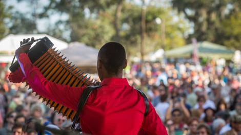 Two-time Grammy nominee, Cedric Watson, energizes the crowd with Zydeco music Two-time Grammy nominee, Cedric Watson, energizes the crowd with Zydeco music