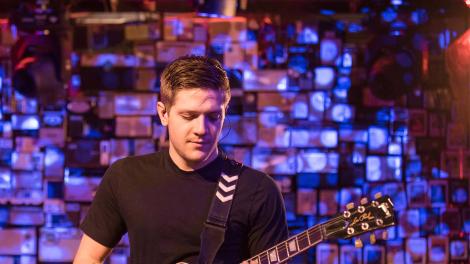 Bass Physics plays guitar in Denver, Colorado