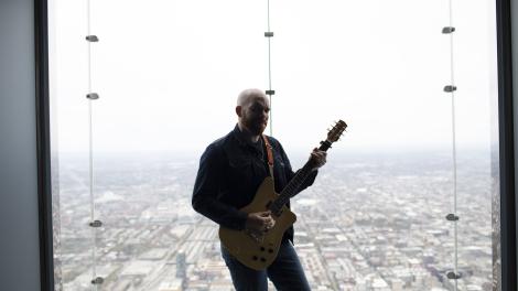 Mike Ledbetter playing the blues in a Chicago, Illinois, skyscraper
