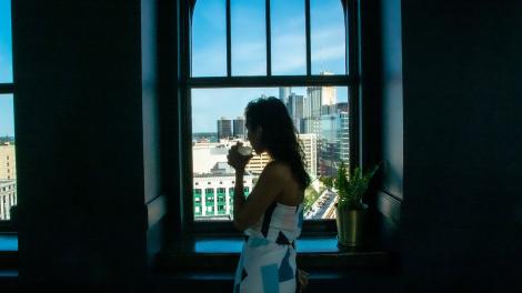 Sipping a craft cocktail at The Monarch Club rooftop lounge in Detroit, Michigan