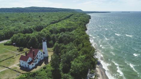 The Point Iroquois Lighthouse overlooking Lake Superior near Sault Ste. Marie, Michigan The Point Iroquois Lighthouse overlooking Lake Superior near Sault Ste. Marie, Michigan