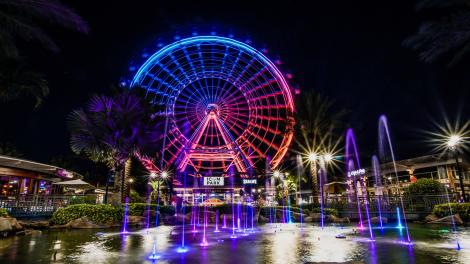 Nighttime view of The Wheel at ICON Park in Orlando, Florida