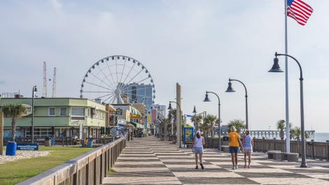 Walking along the Myrtle Beach Boardwalk in South Carolina