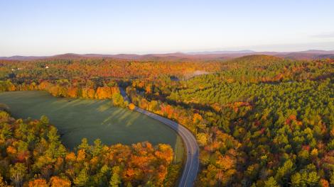 Blazing autumn colors surrounding a winding road in Marlboro Blazing autumn colors surrounding a winding road in Marlboro