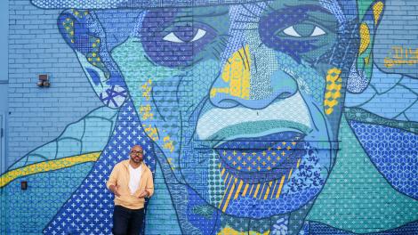 Admiring the colorful murals of Deep Ellum’s Blues Alley in Dallas, Texas