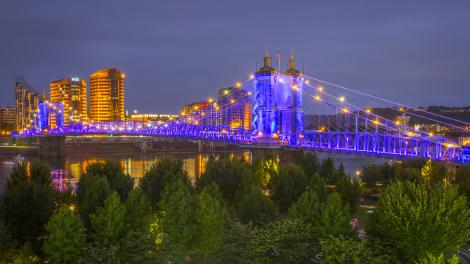 The Roebling Bridge decorated in colorful lights in celebration of BLINK Festival in Covington, Kentucky The Roebling Bridge decorated in colorful lights in celebration of BLINK Festival in Covington, Kentucky