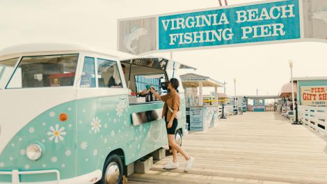 Colorful shops and food trucks line the Virginia Beach Fishing Pier Colorful shops and food trucks line the Virginia Beach Fishing Pier