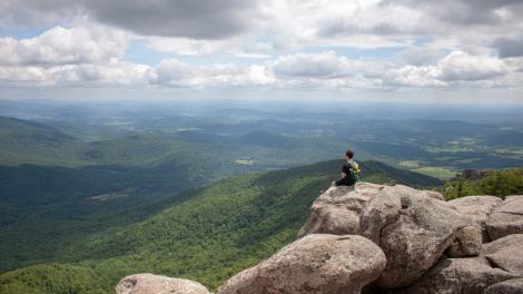Gazing out from the summit of Old Rag Mountain in Shenandoah National Park, Virginia