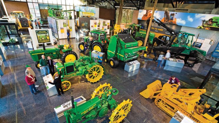Showcasing farming machinery at the John Deere Pavilion in Moline, Illinois