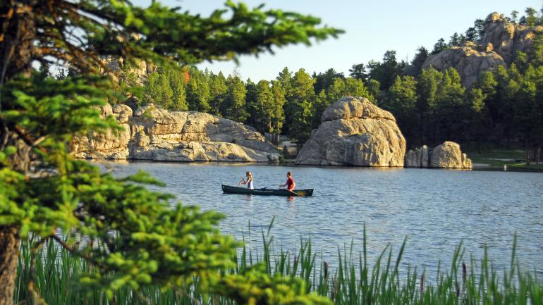 Canoeing in Sylvan Lake, considered the crown jewel of Custer State Park