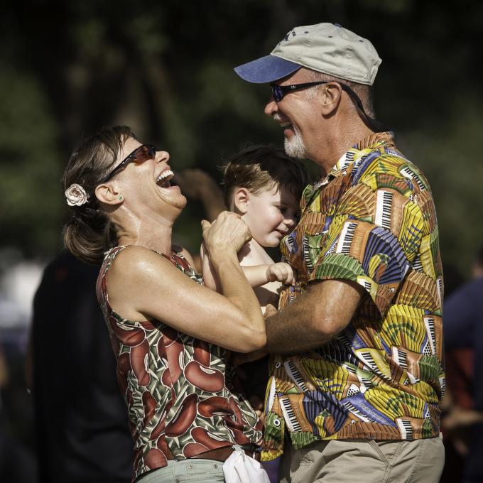 A family having fun at the Festivals Acadiens et Creoles in Lafayette A family having fun at the Festivals Acadiens et Creoles in Lafayette