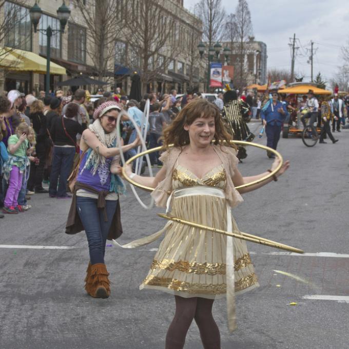 They take fun seriously: The unofficial mascot of Asheville is the hula hoop.
