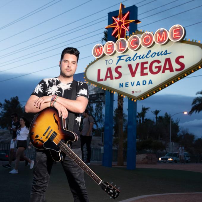 Frankie Moreno in front of Las Vegas sign