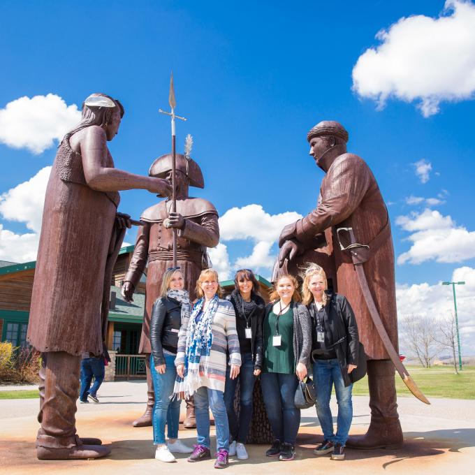 Posing with statues at the Lewis and Clark Interpretive Center in North Dakota
