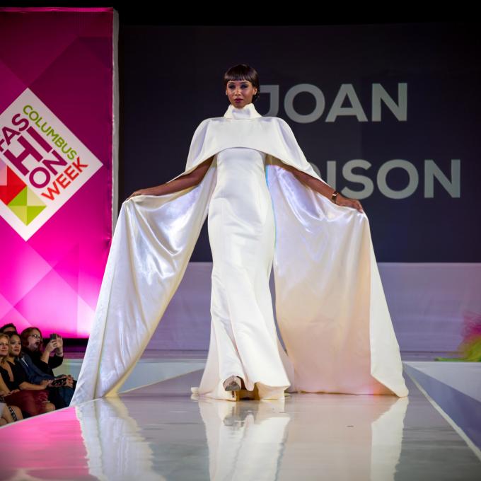Walking the runway in a piece by Joan Madison at Fashion Week Columbus
