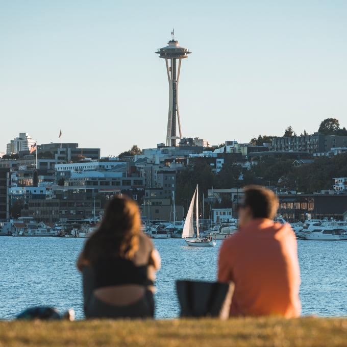 Couple sitting in Gas Works Park in Seattle, Washington Couple sitting in Gas Works Park in Seattle, Washington