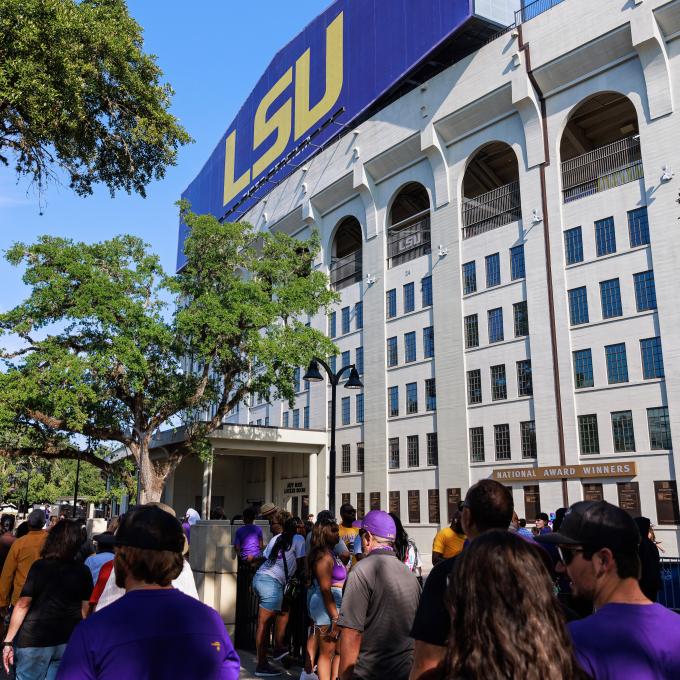 Fans outside Tiger Stadium at Louisiana State University in Baton Rouge, Louisiana Fans outside Tiger Stadium at Louisiana State University in Baton Rouge, Louisiana