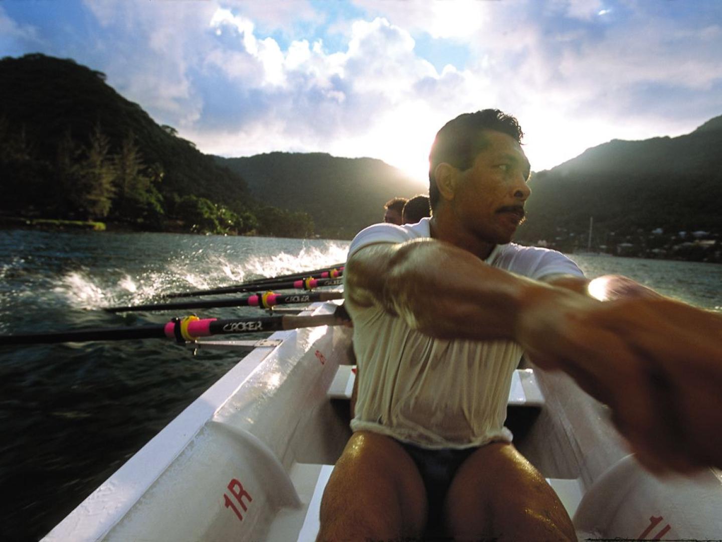 Crew rowing a Fautasi boat in American Samoa Crew rowing a Fautasi boat in American Samoa