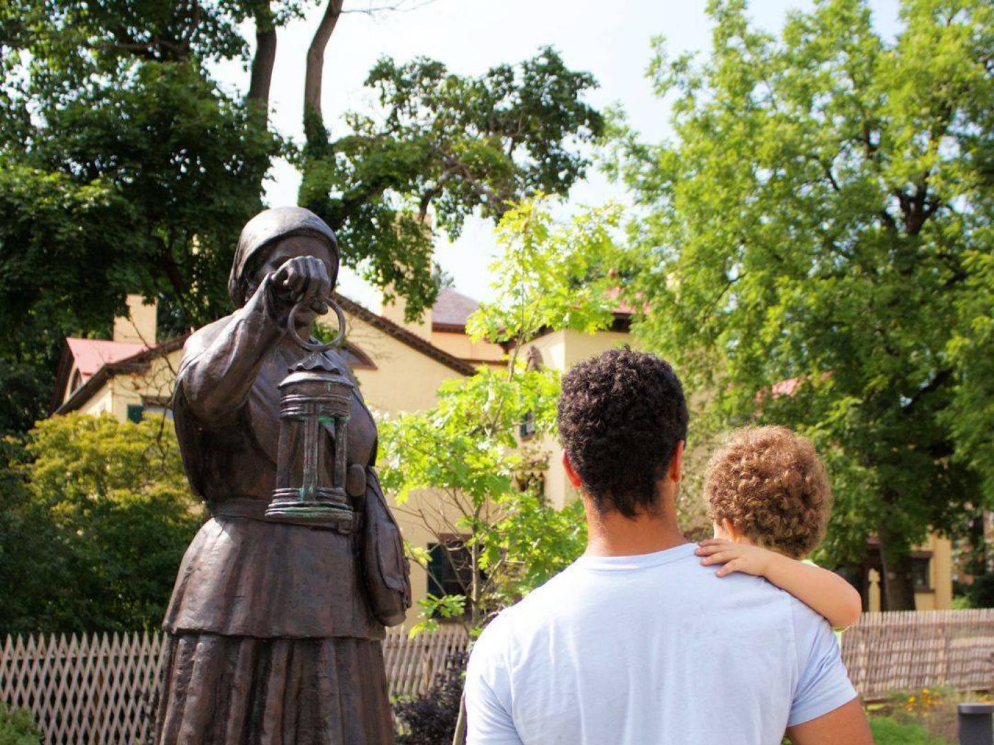 Admiring a statue of Harriet Tubman at the Harriet Tubman Home in Auburn, New York