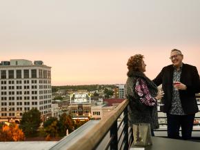 Enjoying drinks and city views at sunset at Vantage Rooftop Lounge and Conservatory