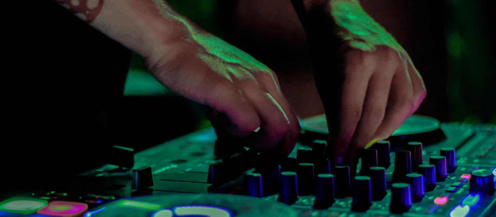 A DJ performs an EDM set