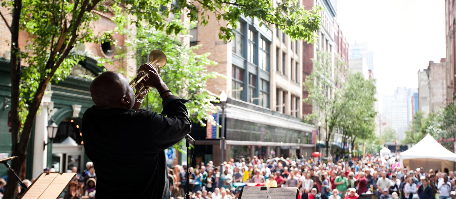 A jazz musician playing at the Pittsburgh International Jazz Festival in Pennsylvania