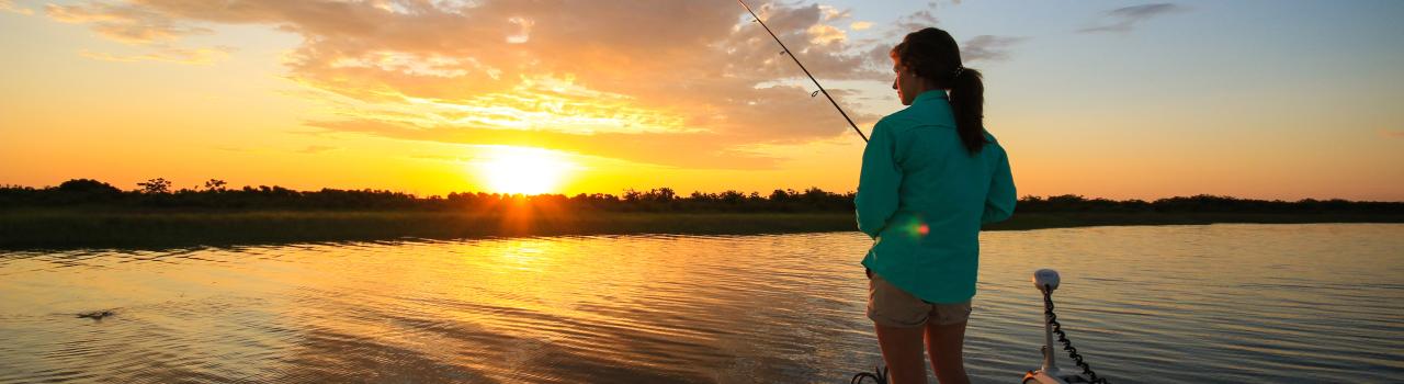 Fishing from a boat on Calcasieu Lake near Lake Charles, Louisiana Fishing from a boat on Calcasieu Lake near Lake Charles, Louisiana