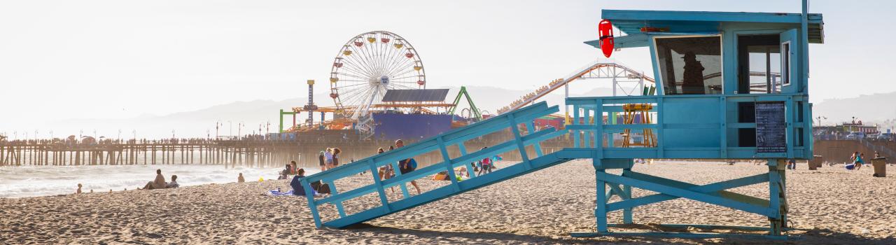 Lifeguard station on the beach with the Santa Monica Pier in the background Lifeguard station on the beach with the Santa Monica Pier in the background