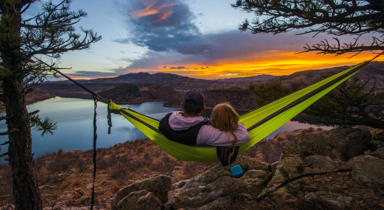 Watching a colorful sunset from a hammock overlooking Horsetooth Reservoir