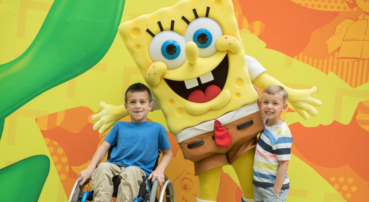 Children excitedly meeting a cartoon favorite at the Mall of America in Bloomington, Minnesota Children excitedly meeting a cartoon favorite at the Mall of America in Bloomington, Minnesota