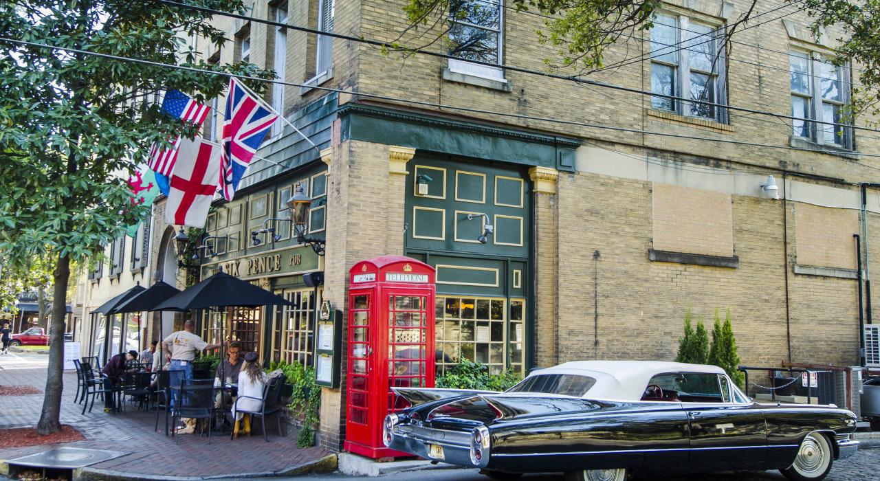 Sidewalk dining at the British-style Six Pence Pub on Bull Street Sidewalk dining at the British-style Six Pence Pub on Bull Street