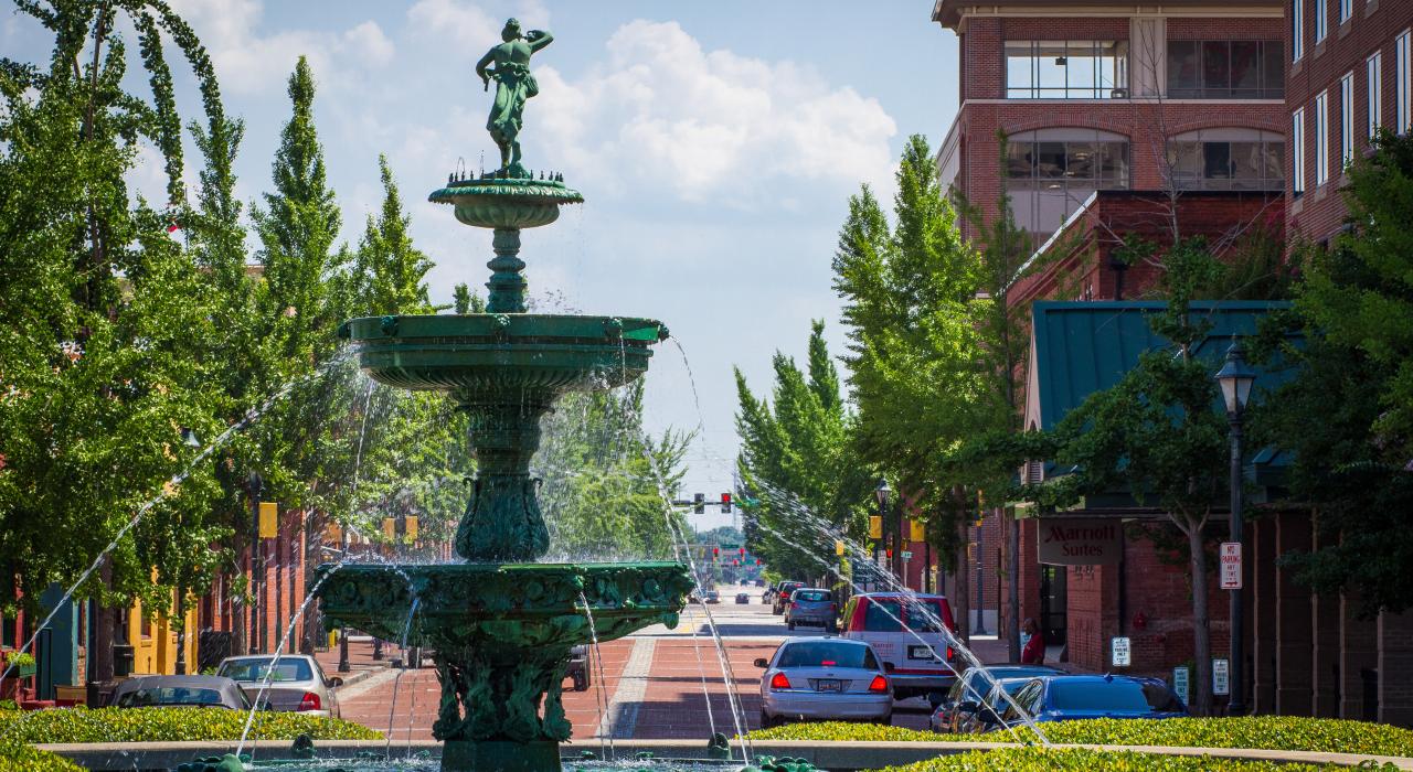 Brick-paved streets, fountains and gardens in the downtown Riverwalk district