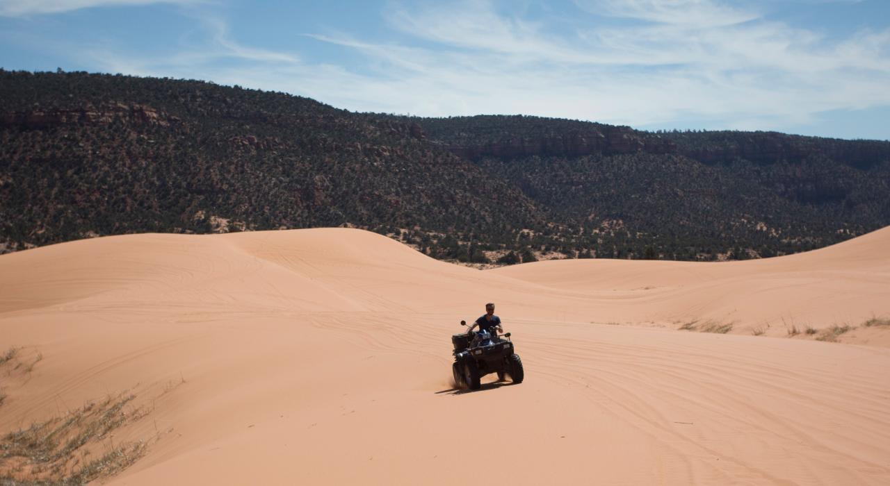Four-wheeling adventure on sand dunes