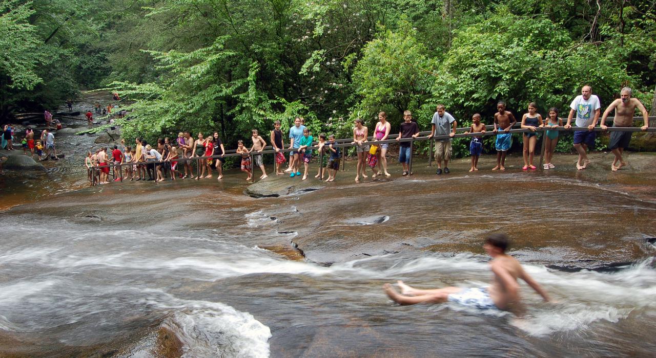 Enjoying nature's water slide at Sliding Rock