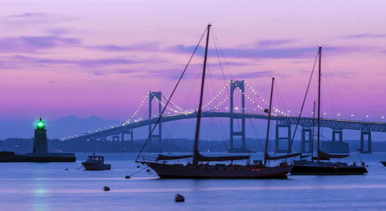 The Newport Bridge and Goat Island lighthouse at sunset