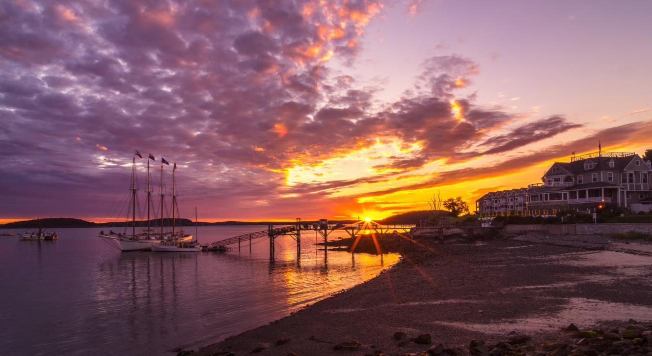 Sun rises on a fall morning over the Motor Inn and Mary Todd ship