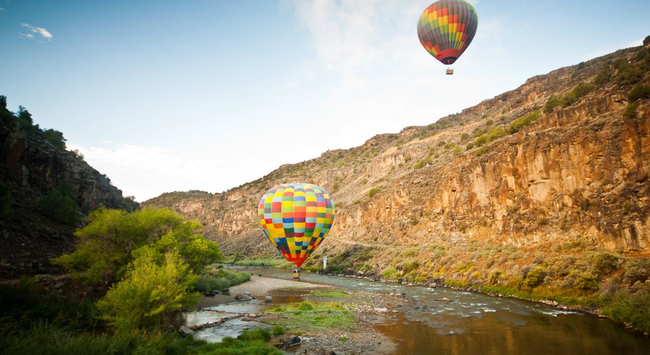 Hot-air ballooning and touching down for a water landing in the Rio Grande Hot-air ballooning and touching down for a water landing in the Rio Grande