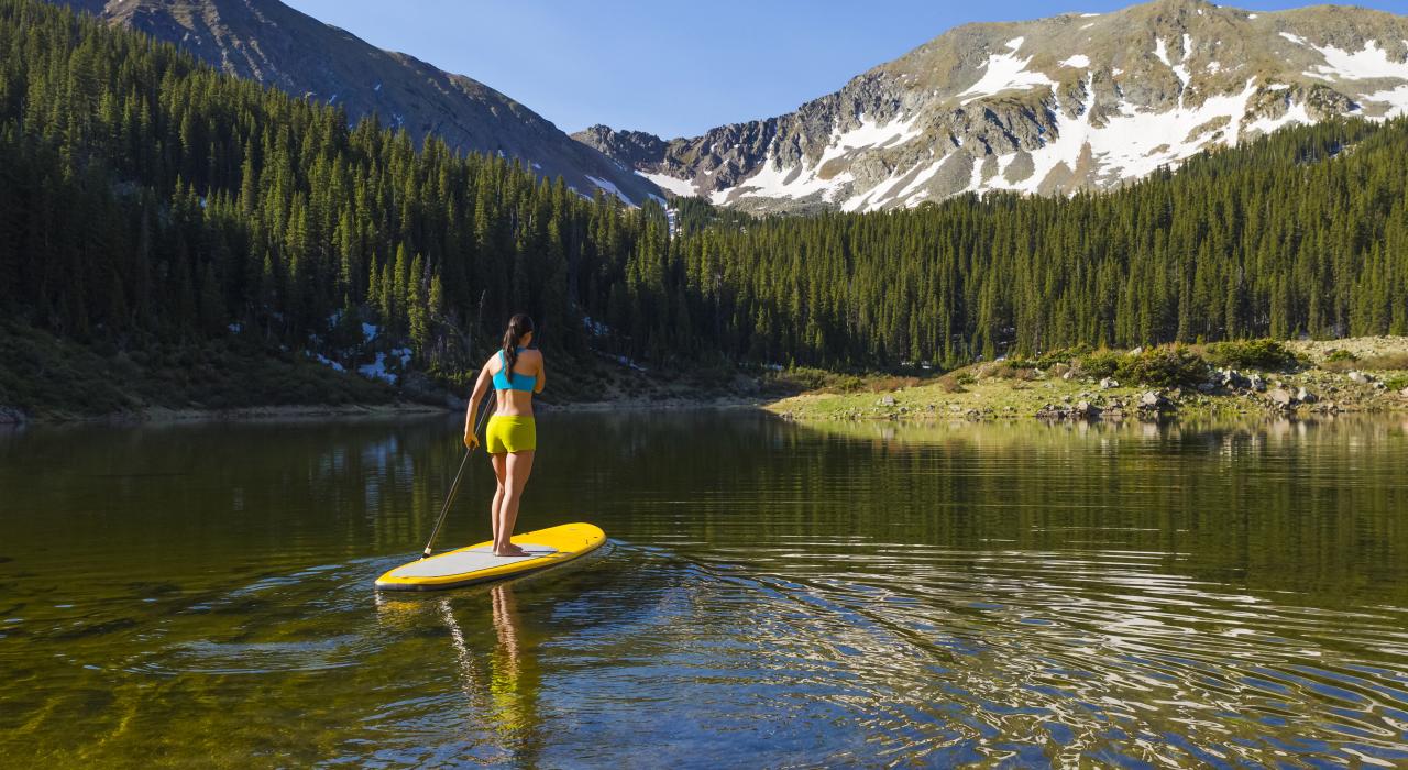 Peaceful paddleboard outing in the mountains Peaceful paddleboard outing in the mountains