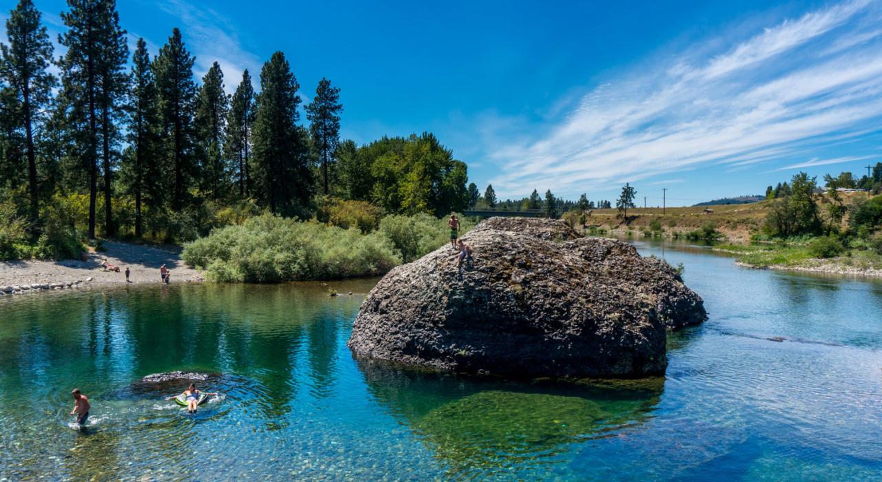 Summer fun in the clear-blue waters of the Spokane River Summer fun in the clear-blue waters of the Spokane River