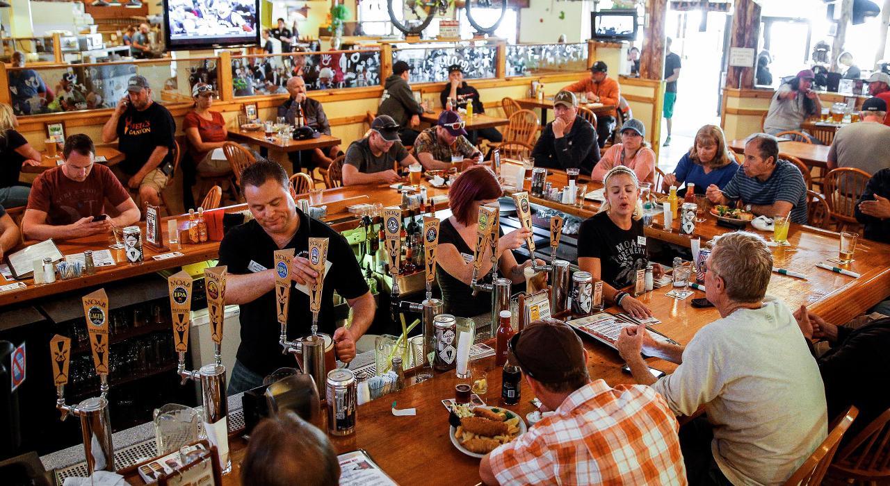 Enjoying pints and pub fare at Moab Brewery, just one option in the growing local craft beverage scene Enjoying pints and pub fare at Moab Brewery, just one option in the growing local craft beverage scene