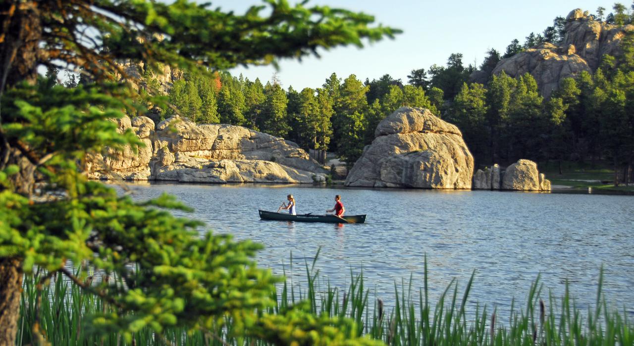 Canoeing in Sylvan Lake, considered the crown jewel of Custer State Park