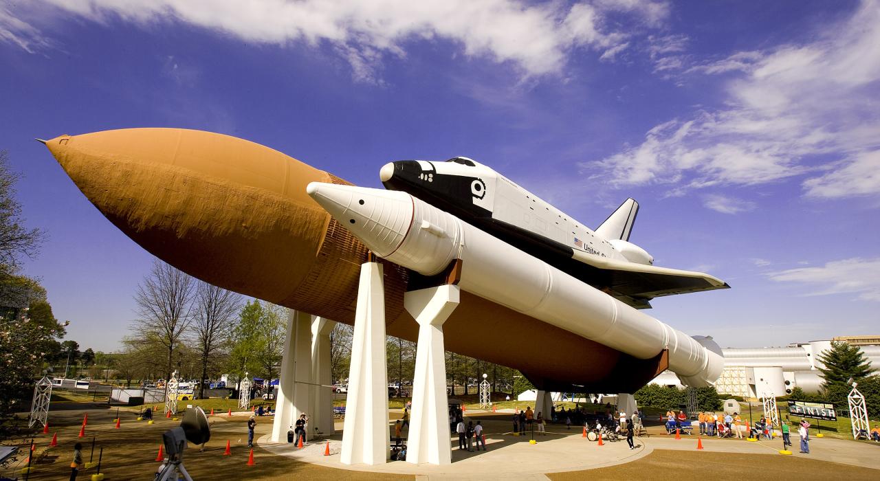A space shuttle, external tank and two rocket boosters on display at the U.S. Space & Rocket Center