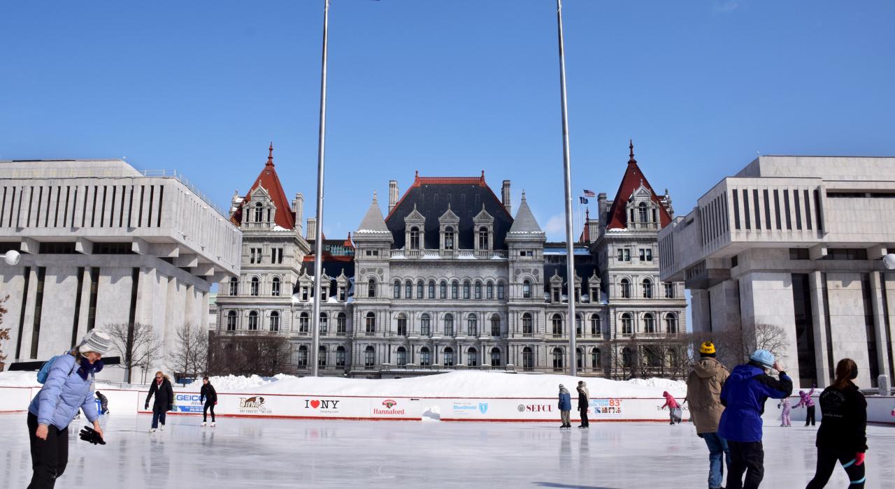 Ice skating at the Empire State Plaza with views of the New York State Capitol Building Ice skating at the Empire State Plaza with views of the New York State Capitol Building